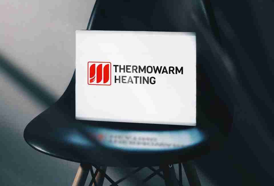Thermowarm Heating Logo by Cammy Graphic design